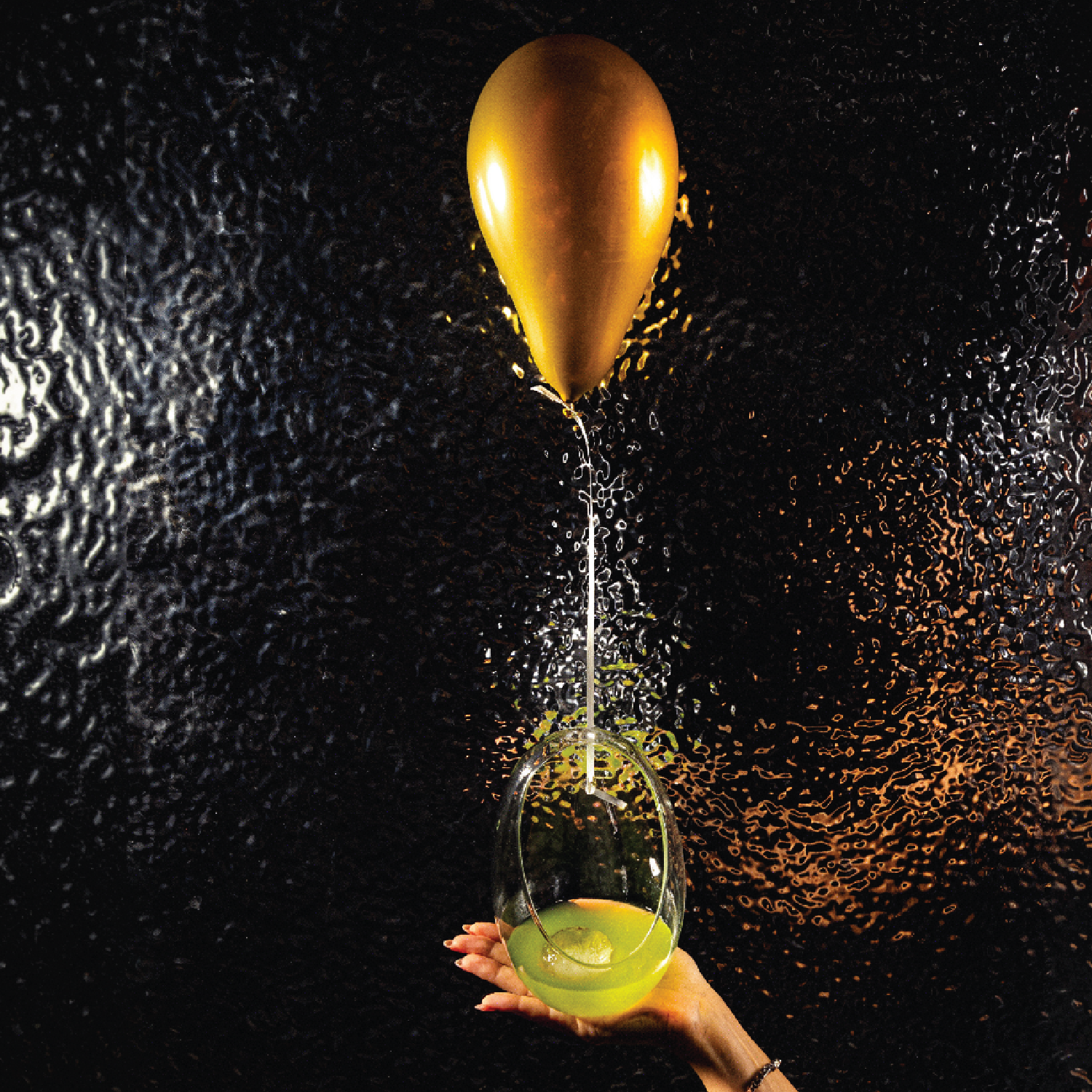 Market Vibes cocktail with gold balloon at Kuch Kuch in St Julian's, Malta